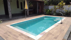 Casa em poucos passos da praia de Jaconé